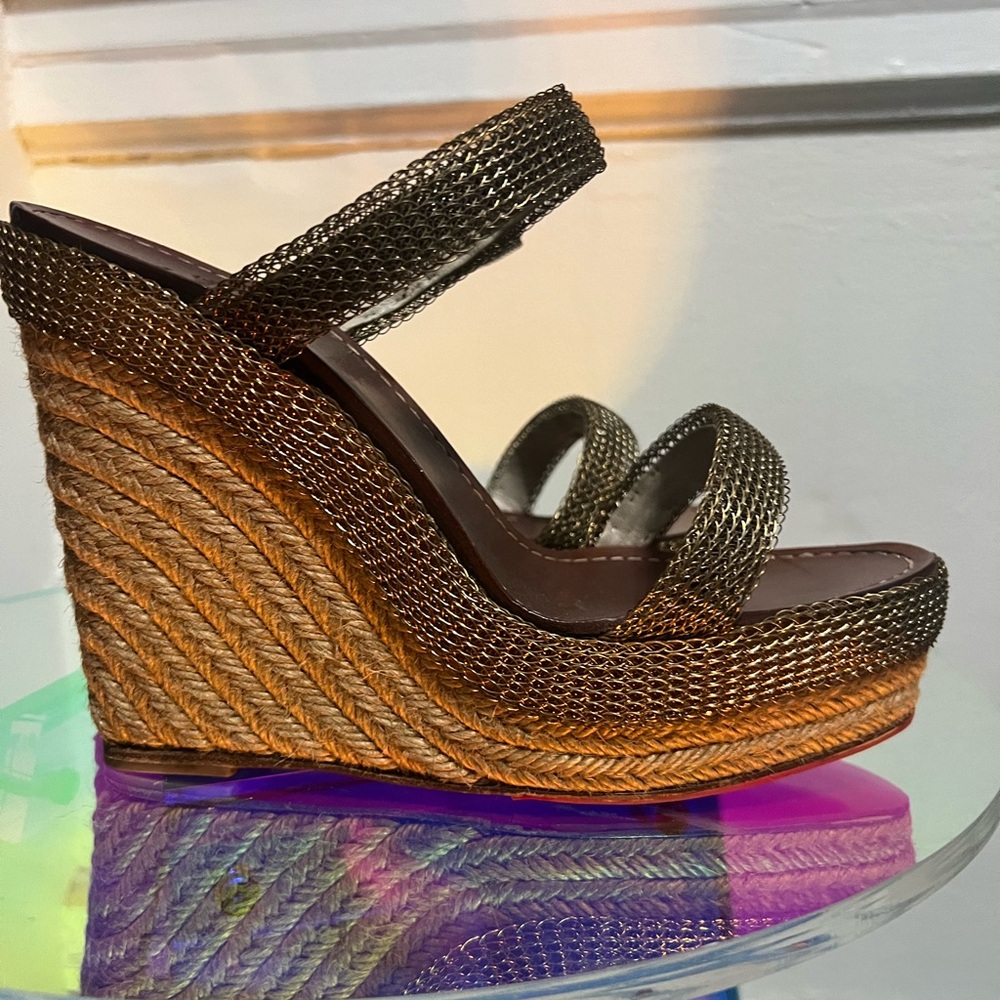 Christian Louboutin Wedges
Great Condition! 
Reinforced red bottoms!
Size 40
